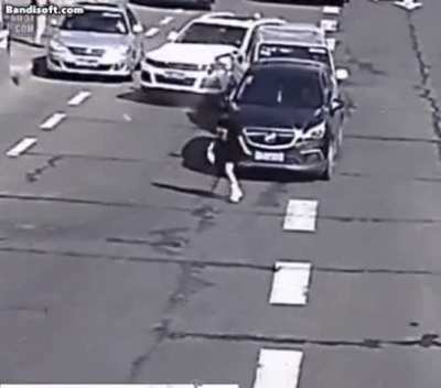 "Don't mind me, just crossing the street"- that dumbass, probably