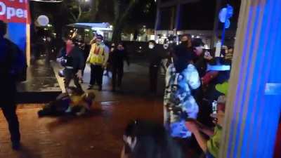 Cop violently shoving an unarmed person from behind for sport