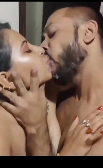 Tina Nandy kissing.