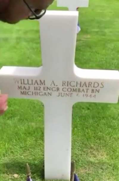 French caretakers take the sand from Omaha Beach and scrub them into the letters to give them the brown/gold coloring.