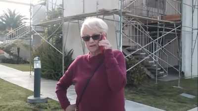 Karen purposely stands in front of a camera then calls 911 because she's now being filmed