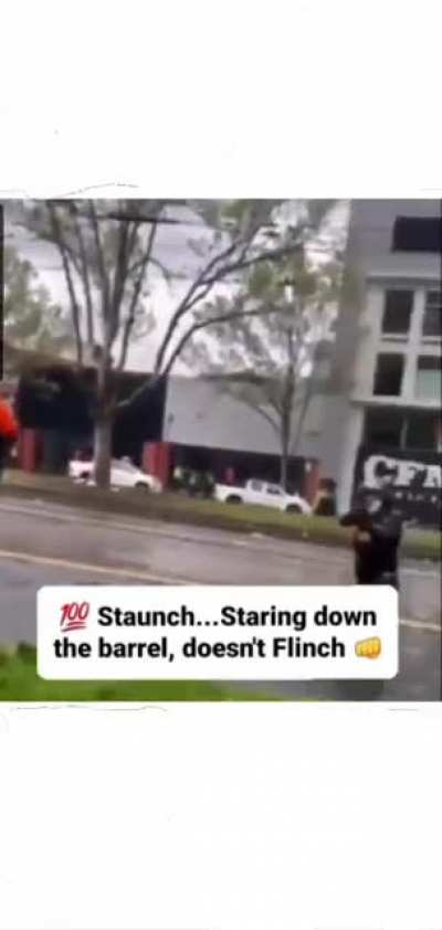 Savage protester inciting violence towards the peaceful police (MELBOURNE)