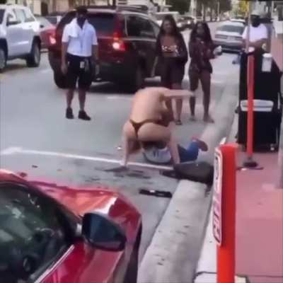 Topless white girl fights two African American women in Miami Beach