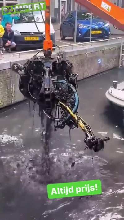 Cleaning the canals in Amsterdam