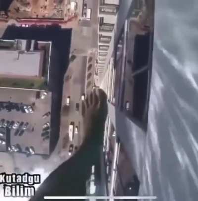 A clear pool on a skyscraper