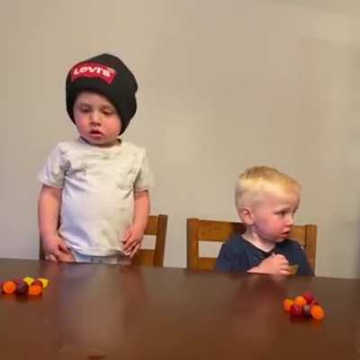 The video of these babies communicating without a single word is everything.