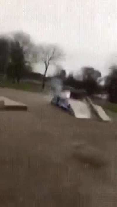 Surrounding a large firecracker in bottles of gasoline
