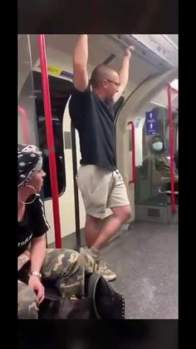 Man is being racist on the tube. Gets absolutely LAMPED