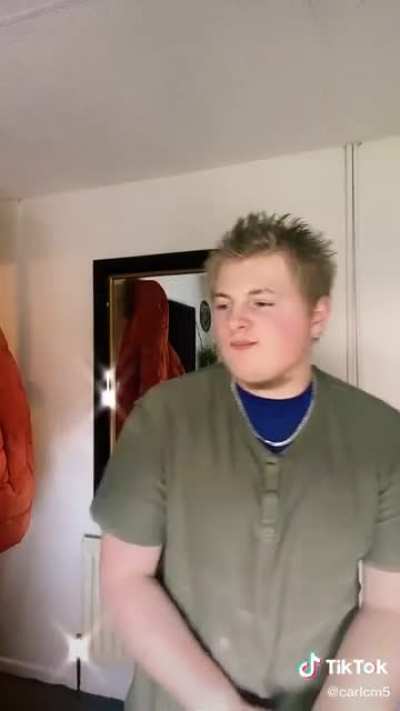Guy Ferrari in his formative days, showing off his tits and bum fluff beard