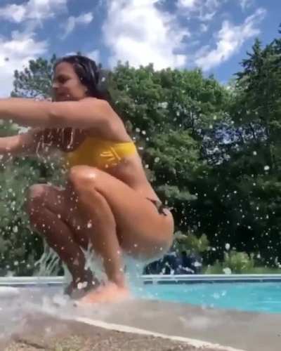 Jumping out of a pool.