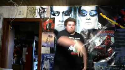 infamous german neckbeard "Drachenlord" (Dragonlord) showing off his skills with the blade