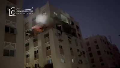 The first moments after the israeli occupation forces bombed a residential apartment in the city of Khan Yunis, west of Khan Yunis