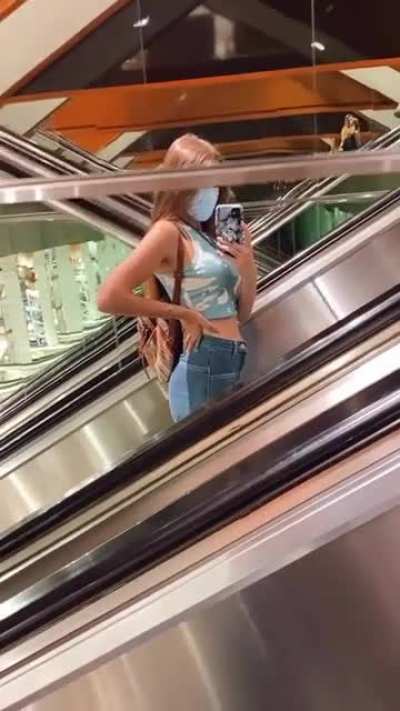 Escalator mirror