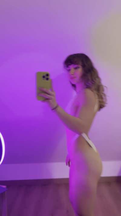 Cosmic cheeks under purple lights