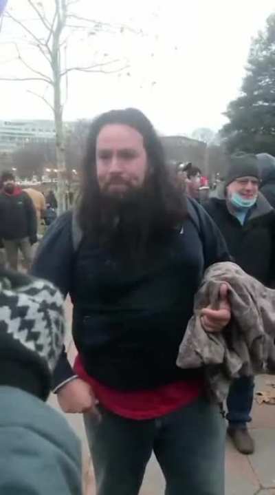 This Trump Terrorist was caught on camera beating a Capitol Police Officer unconscious with an American flag. Please contact the FBI if you know who he is.