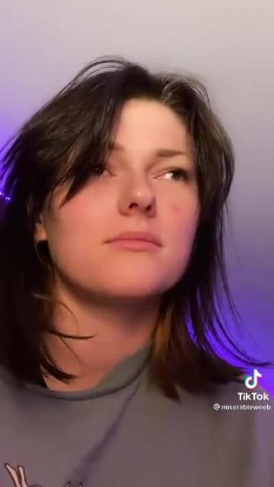 She smiles in frown