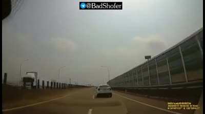 Guy on the bike thought the guy in the car has no balls.