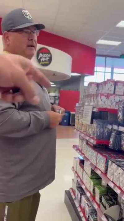 Man child caught ruining cards and placing them back on the rack