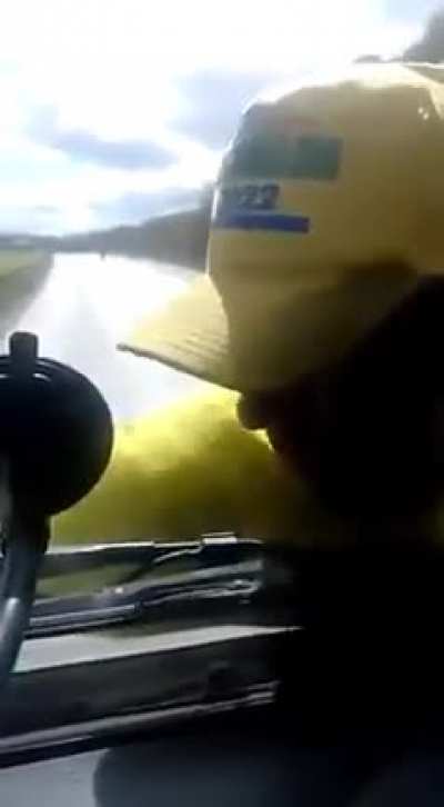 Bolsonaro&rsquo;s supporter grabs truck to stop it. Driver doesn't care and takes him for a ride.