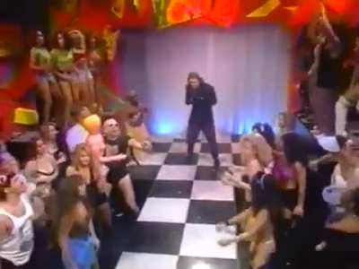 A Truly Bizarre &amp; Unintentionally Hilarious Musical Performance By Corey Feldman On The Howard Stern Show (1992)