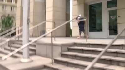 52-yr-old Tampa teacher Audrey Southard-Rumsey runs away from federal court after her first appearance Wednesday afternoon. She is charged with felony assault of a federal police officer in connection with Jan 6 Capitol insurrection.