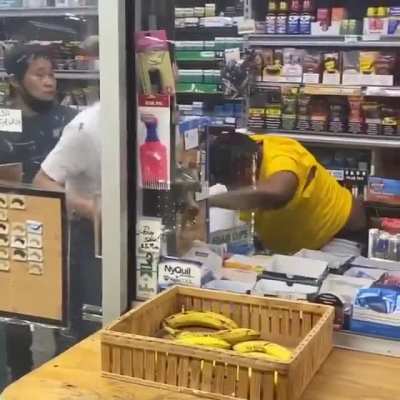 Going behind the counter to fight the convenience store clerk.