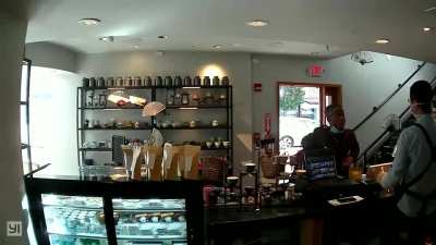 Racist man comes into tea shop and pepper sprays cashier