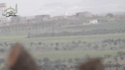 FSA destroy a moving SAA BMP with a TOW missile.Hama, Syria 2017.