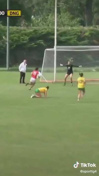 Ciara O&rsquo;Sullivan of Cork putting two Donegal defenders on the deck
