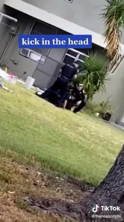 Police officer runs up and kicks a man in the head WHILE the man is successfully being placed in handcuffs and not resisting