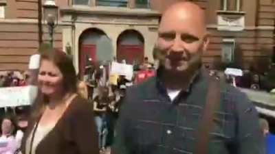 PA State Senator Doug Mastriano points and laughs at protestor starting "Lock Him Up" chant in reference to Dr Rachel Levine