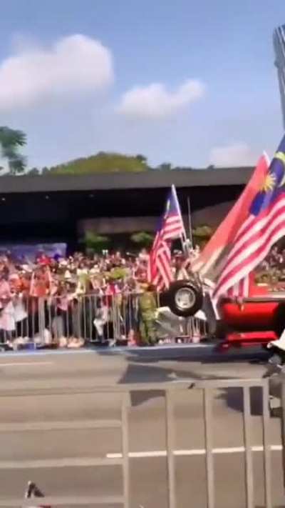 Kid's greeting people "differently" during a holiday parade