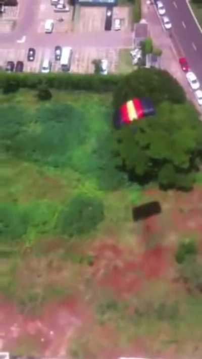 This guy literally bought a parachute on the internet and tried to jump from his own apartment. The crying woman in the end is his wife saying: "what a crazy man"