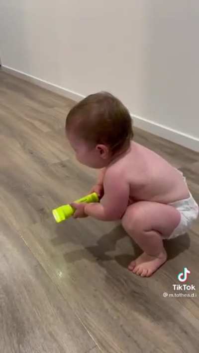 Toddler with a flashlight