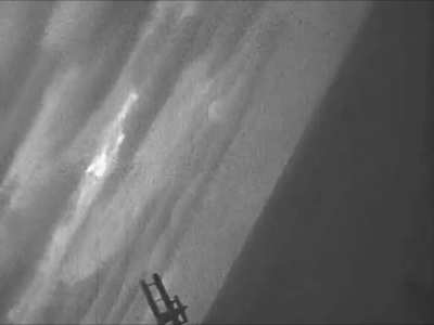 Japanese Aichi D1A biplane blown up by gunfire from a US Navy aircraft off Okinawa on June 5th 1945