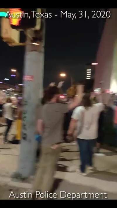 Austin Texas Protester Takes BeanBag Shotgun Round To The Head.
