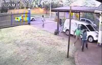 A group of guys tries to rob an elderly couple in South Africa but is deterred by a shirtless dude with a gun