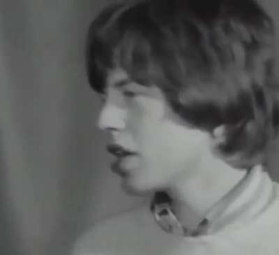Mick Jagger being diplomatic when asked "How do you compare your group with the Beatles?" 1965