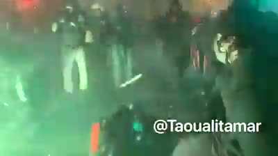 French protesters vs cops in riot gear