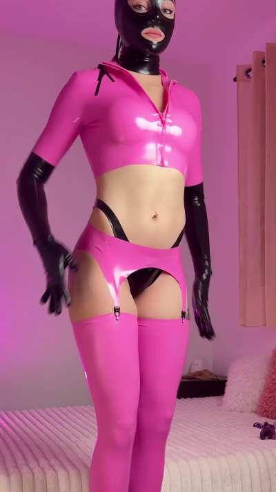 Pink latex dreams&hellip; with a darker twist underneath. 💋&nbsp;How long could you keep eye contact before giving in?