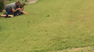 Kid goes crazy, smashes car windows, throws rocks at neighbours and gets arrested after.