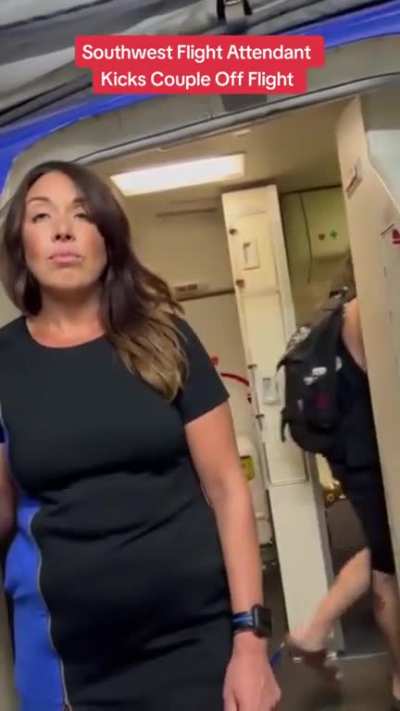 Southwest Stewardess bars couple from boarding their flight. 