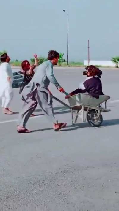 Camera Man uses Wheel borrow for low budget local film