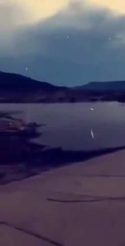 Bullets reflecting off the surface of the water
