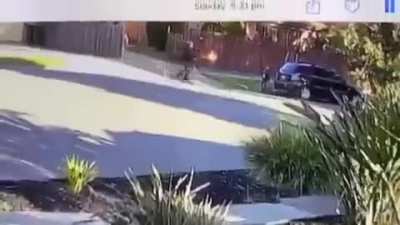 Kid rides straight into the back of a parked car