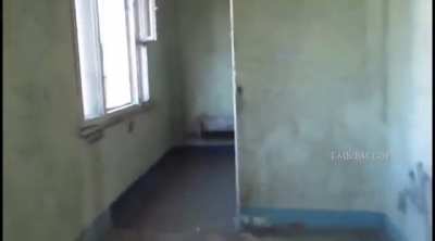 Russian tank shooting at civilian filming from apartment building 25km west of Kyiv