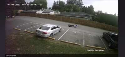 Guy tries to steal tires from next door on his bicycle…