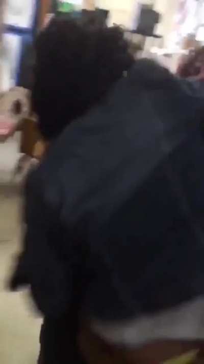 Two girls go at it in art class
