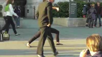 A street vendor selling action "fight scene" shots