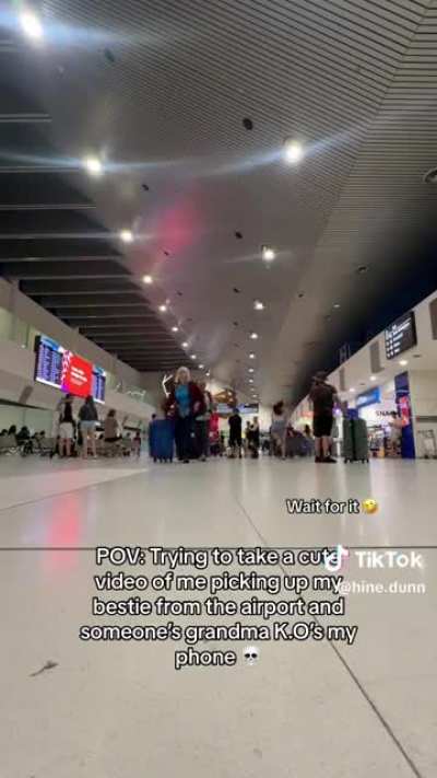 The woman left her phone to record herself picking up her friend and it happened